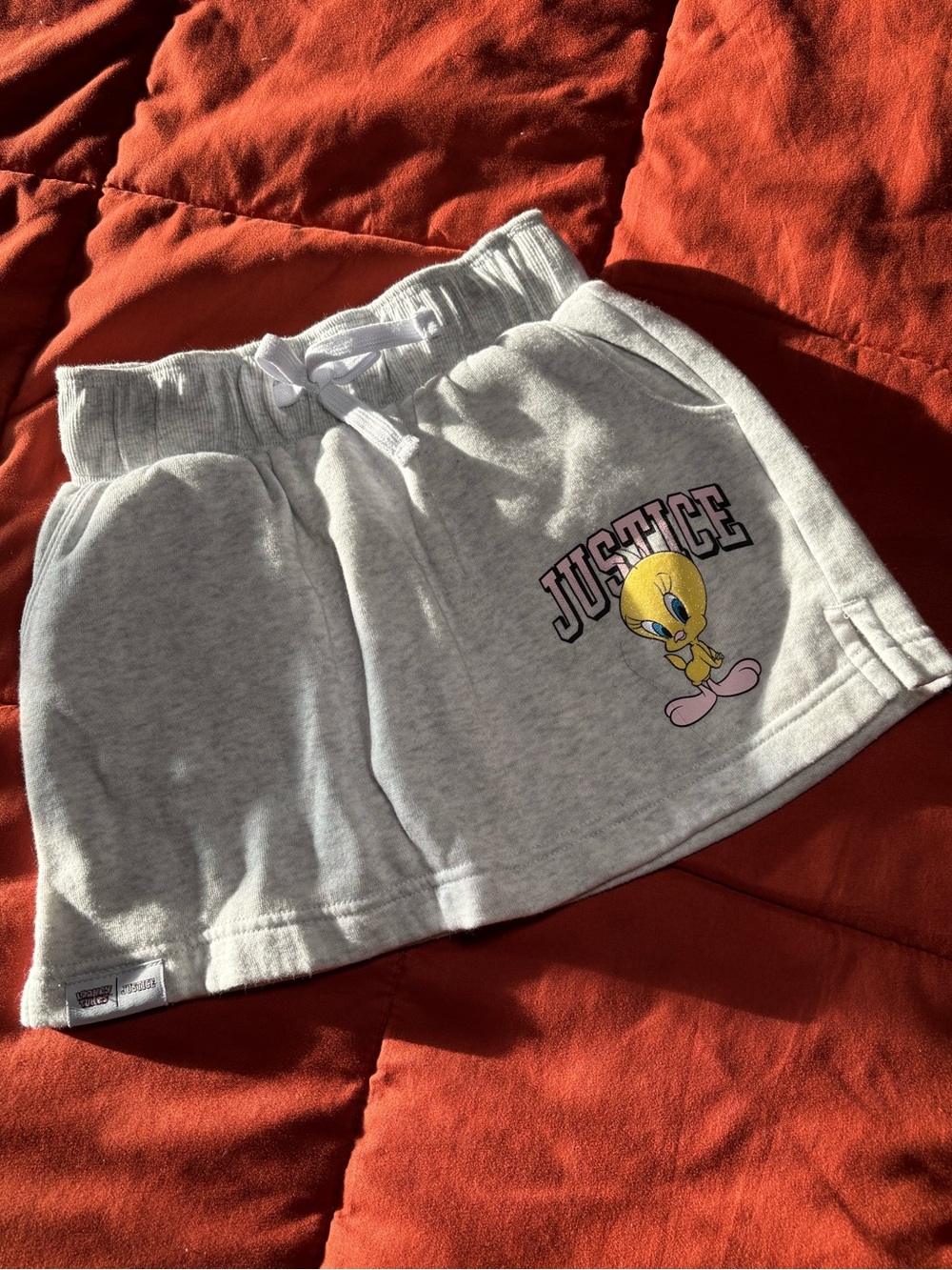 Justice Light Gray Tweety Graphic Skort with Pink Accents